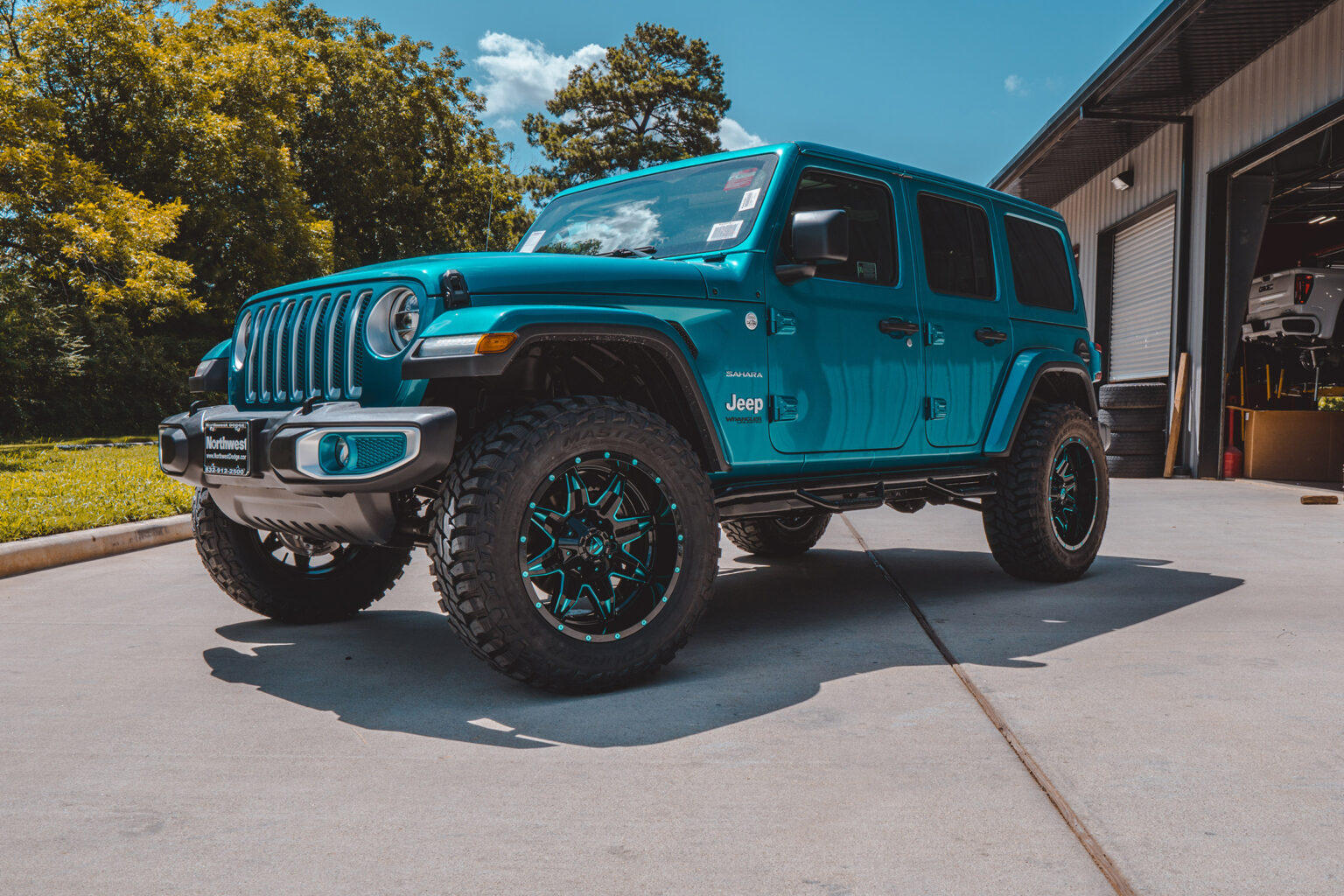 Black Jeep With Teal Accents